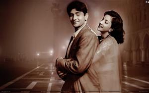 One of the top pairs of Bollywood, Raj Kapoor & Nargis in a romantic pose